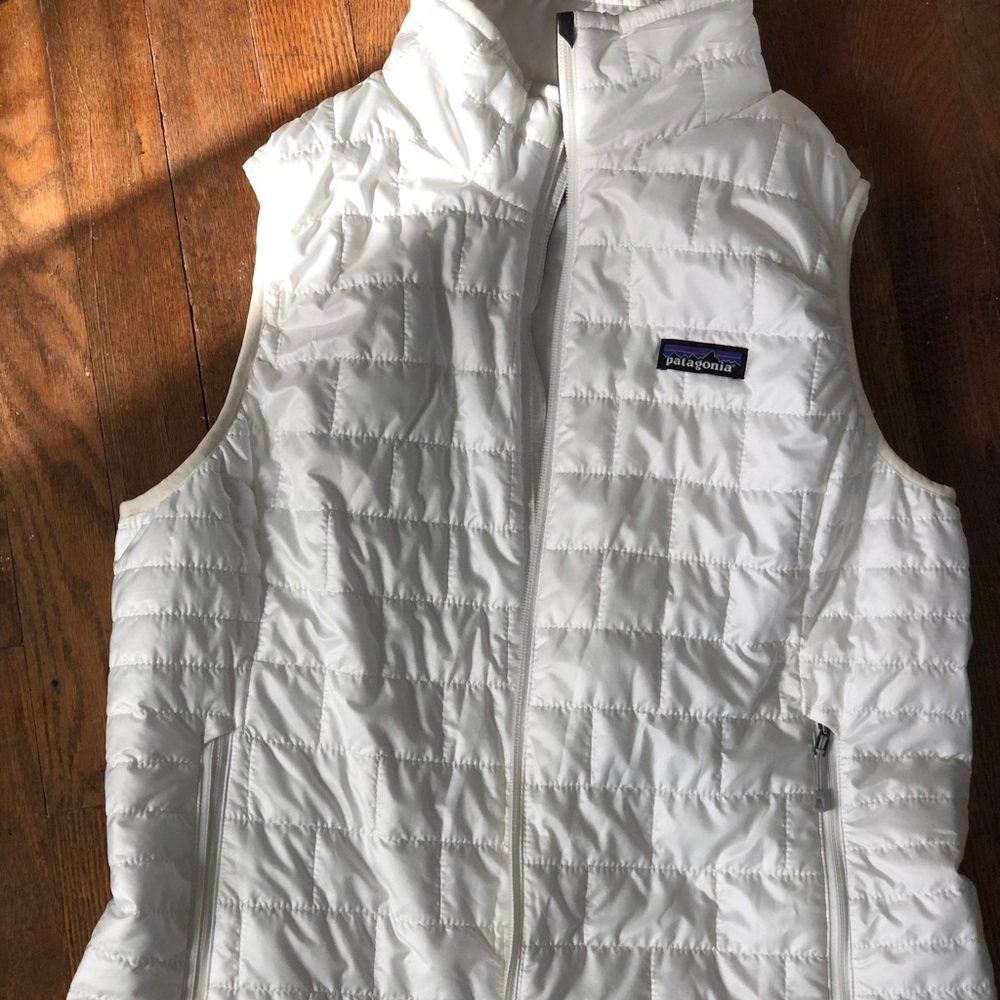 White vest.
